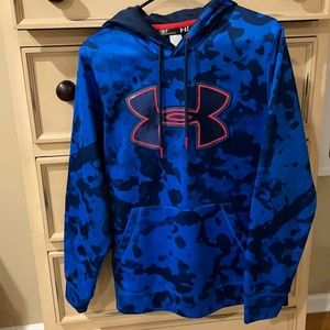 Men’s UA Hoodie. Royal blue with navy design and orange color accents.